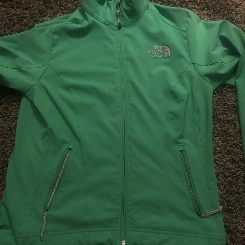 Green North Face Zip up jacket